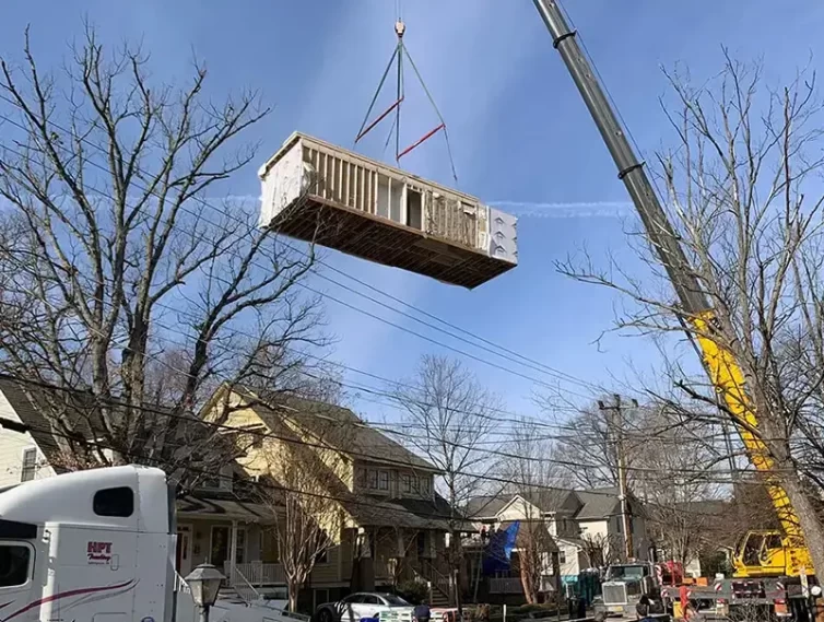 Second Story Addition being lifted Arlington