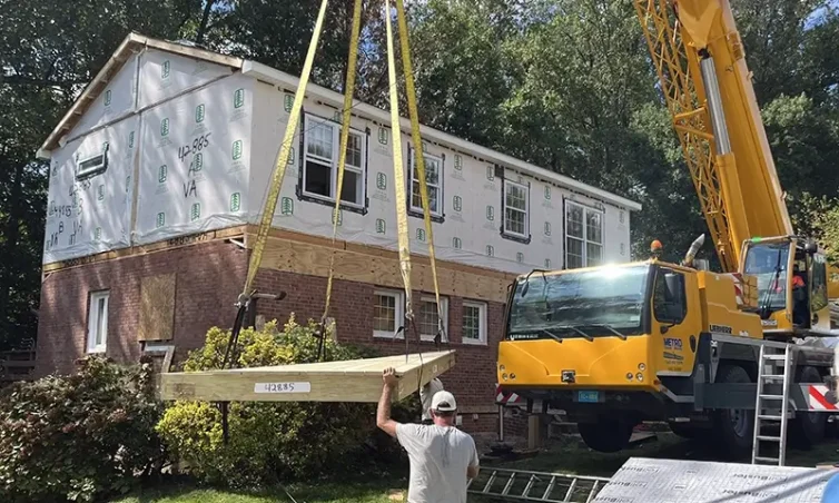 Crane lifting modular addition in springfield